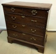 A 19th Century mahogany chest, the top w