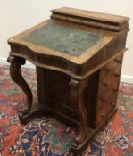 A Victorian burr walnut veneered Davenpo