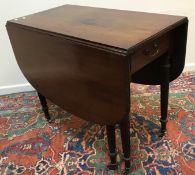 A Victorian mahogany Pembroke table,