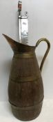 A large brass bound coopered oak jug or