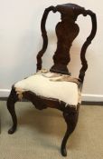 An 18th Century walnut dining chair in t