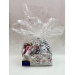 Blooms the Chemist hamper containing perfume, male and female toiletry bags, chocolates, hand