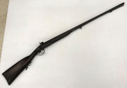 A 19th Century muzzle loading hammer action, double 33" barrels approx, side by side shotgun,