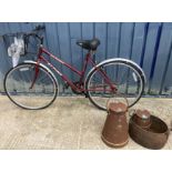 A Ranger Alpine ladies bicycle with basket with Shimano Index and XRM seat together with two iron