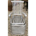 A pair of teak slatted garden steamer type chairs CONDITION REPORTS Have general