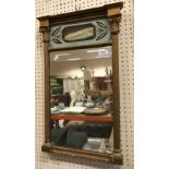 An early 19th Century carved giltwood and gesso framed pier glass,