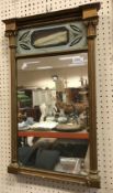 An early 19th Century carved giltwood and gesso framed pier glass,