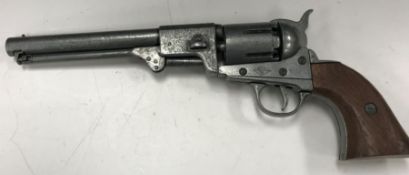 A replica Colt single action army .45 six shot revolver .