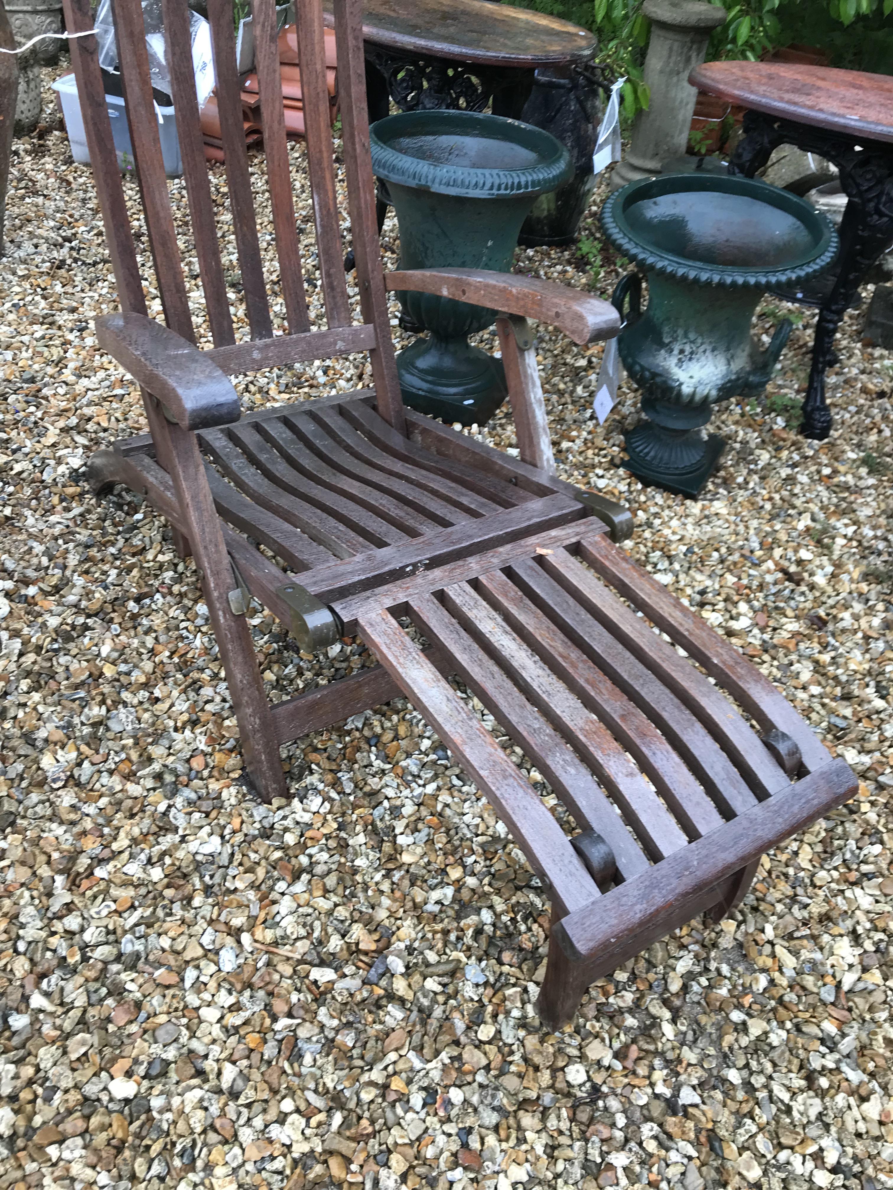 A pair of teak slatted garden steamer type chairs CONDITION REPORTS Have general - Image 3 of 11