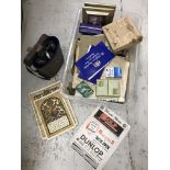 A collection of assorted ephemera to include various playing cards,