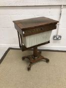 A late Regency mahogany and brass inlaid sewing table,