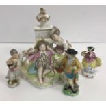 An 18th Century Höchst porcelain figure group depicting "A sleeping boy and young girl and dog on a