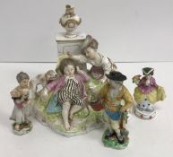 An 18th Century Höchst porcelain figure group depicting "A sleeping boy and young girl and dog on a