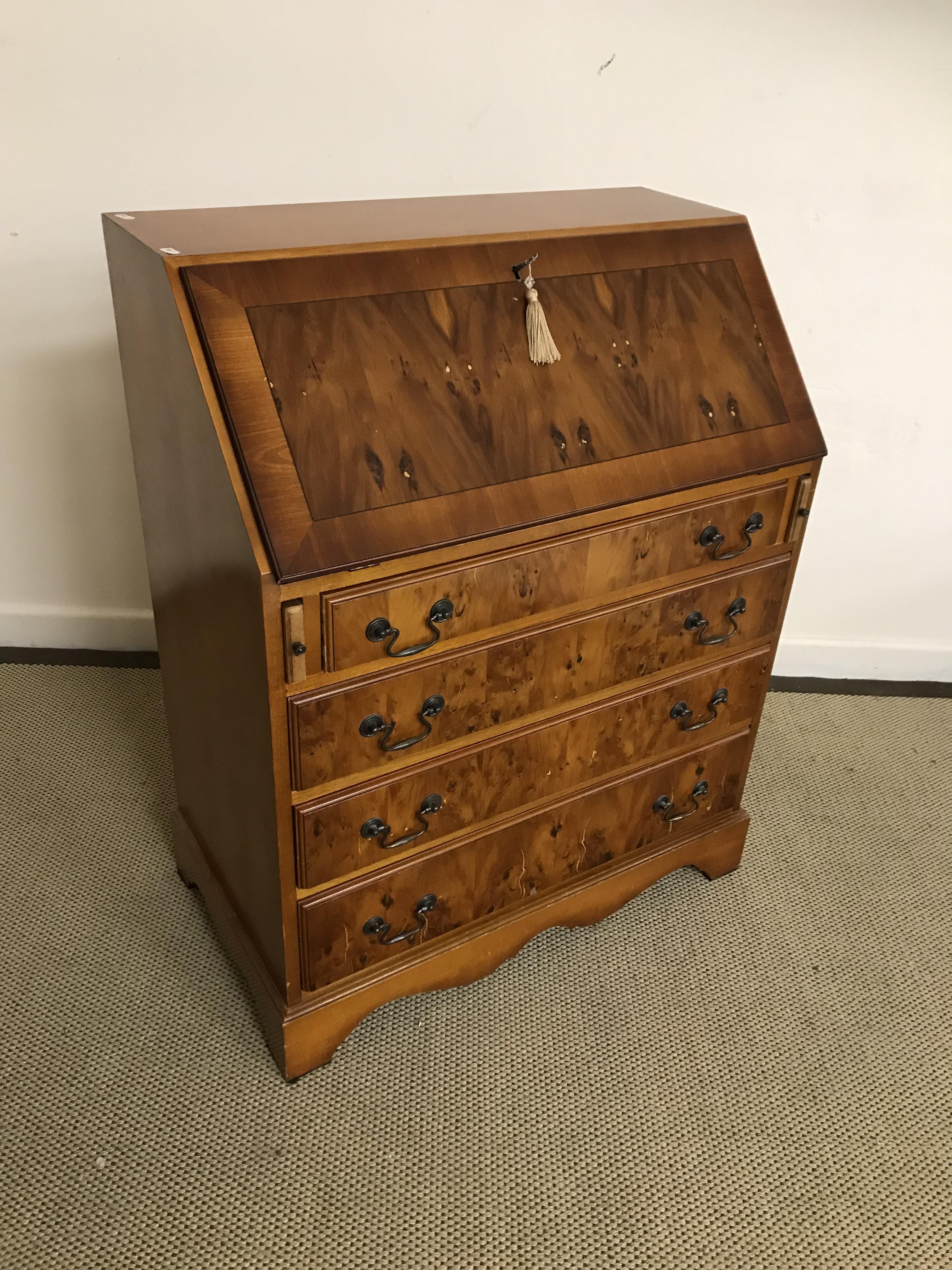 A modern yew wood bureau with fall front above four long drawers 78 cm wide x 43 cm deep x 96 cm