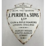 A J Purdey & Sons Limited shield shaped sign, inscribed "By Royal Appointment to H.