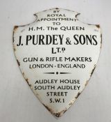 A J Purdey & Sons Limited shield shaped sign, inscribed "By Royal Appointment to H.