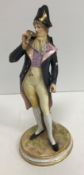 A late 19th Century Meissen figure of "A gallant standing by tree stump in 18th Century dress",