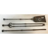 A set of three 19th Century steel fire irons of plain form with octagonal faceted finials to the