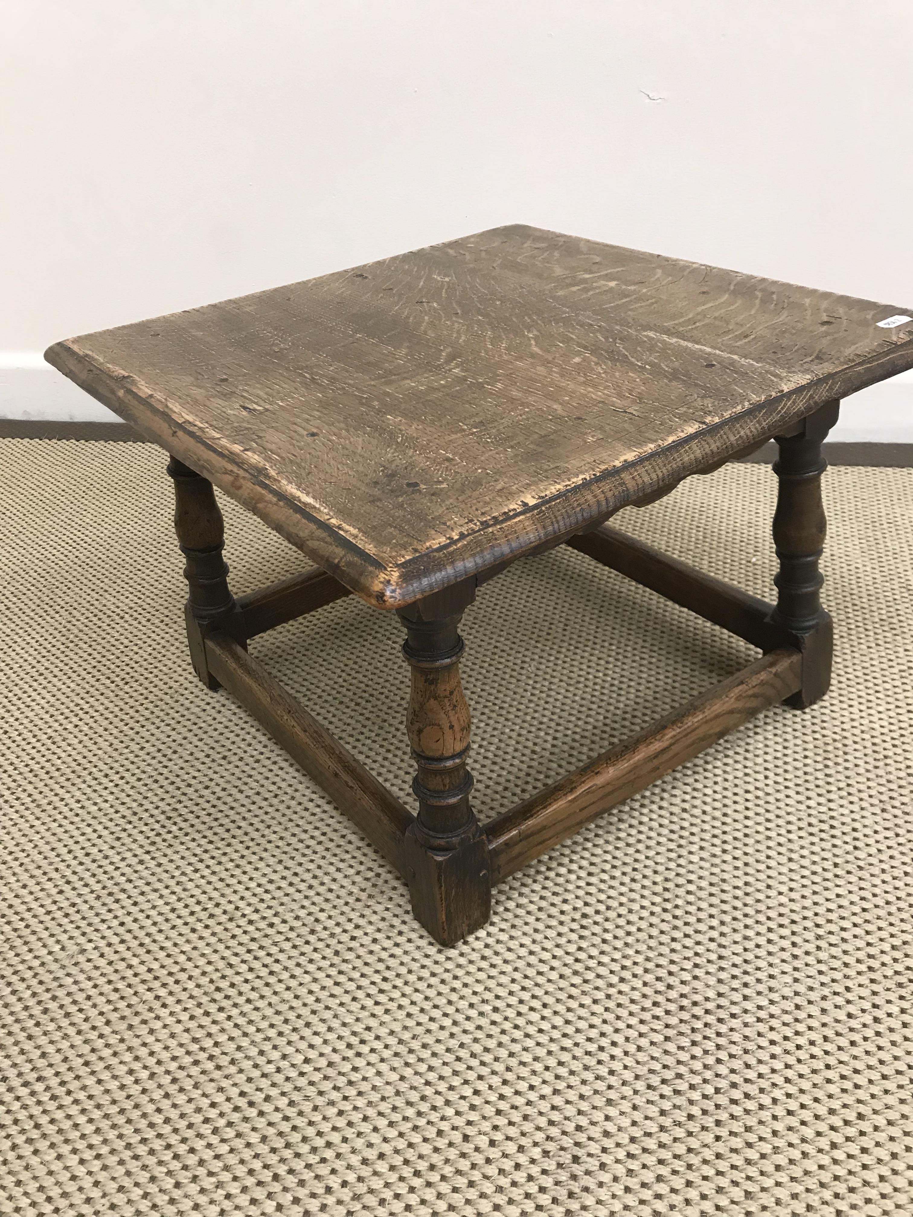 An 18th Century oak oval gate-leg drop-leaf dining table on barley-twist supports united by - Image 3 of 3