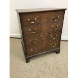 A 19th Century oak commode chest converted to two door cupboard, raised on bracket feet, 63.