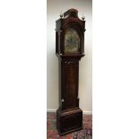 A George III mahogany long case clock, the eight day movement with brass arched dial,