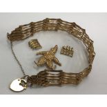 A 9 carat gold gate link bracelet with heart shaped lock, 6.