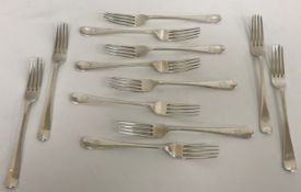 A set of twelve George VI silver "Old English" pattern dessert forks and a matching set of twelve