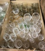 Three boxes of assorted glassware to include sundae dishes, wine glasses, jug,