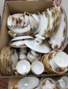 A collection of Royal Albert "Country Roses" dinner wares including seven dinner plates,