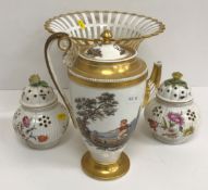 A pair of 19th Century porcelain floral spray decorated pot pourri pots and covers with yellow rose