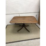 A 19th Century rosewood breakfast table,