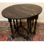 WITHDRAWN An 18th Century oak oval gate-leg tea table of small proportions, with single end drawer,