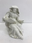 An 18th Century Bow figure blanc de chine study of "A nun seated reading",