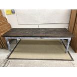 A modern stained and painted pine farmhouse style kitchen table,