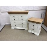 A modern cream painted chest of drawers,