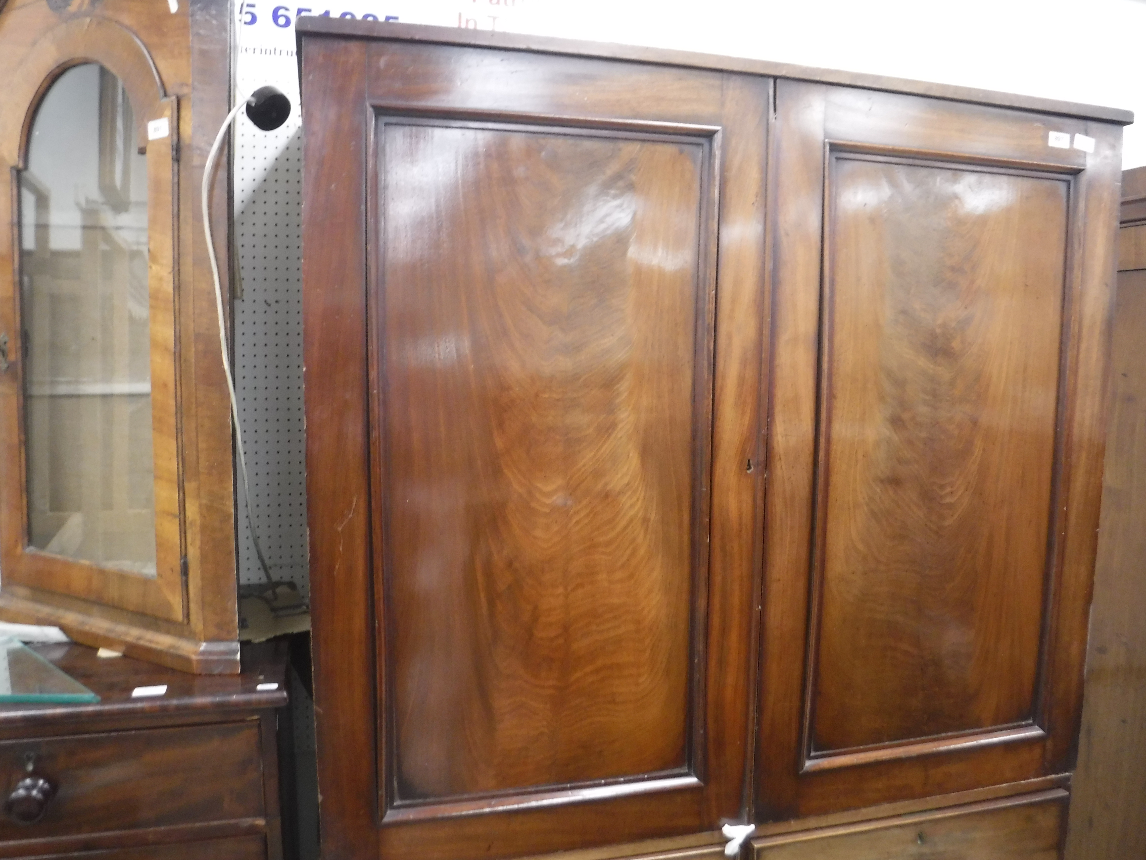 A Victorian mahogany linen press (marriage) the plain top of two sliding cupboard doors above a - Image 3 of 14