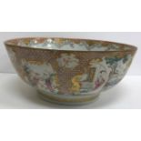 A Chinese Kangxi punch bowl, the inner field decorated with fruit and flowers,