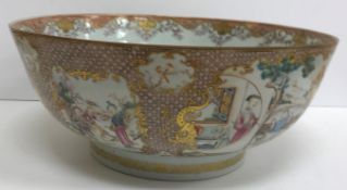 A Chinese Kangxi punch bowl, the inner field decorated with fruit and flowers,