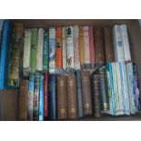 Five boxes of various books including various novels, references, etc,