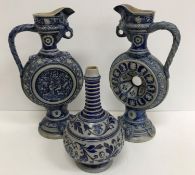 Two similar Westerwald-Mettlach type blue vases / jugs, 37 cm high,