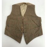 A collection of seven various mid 20th Century wool/tweed type waistcoats