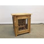 A modern pine and wire work six section wine storage cabinet of meat safe form