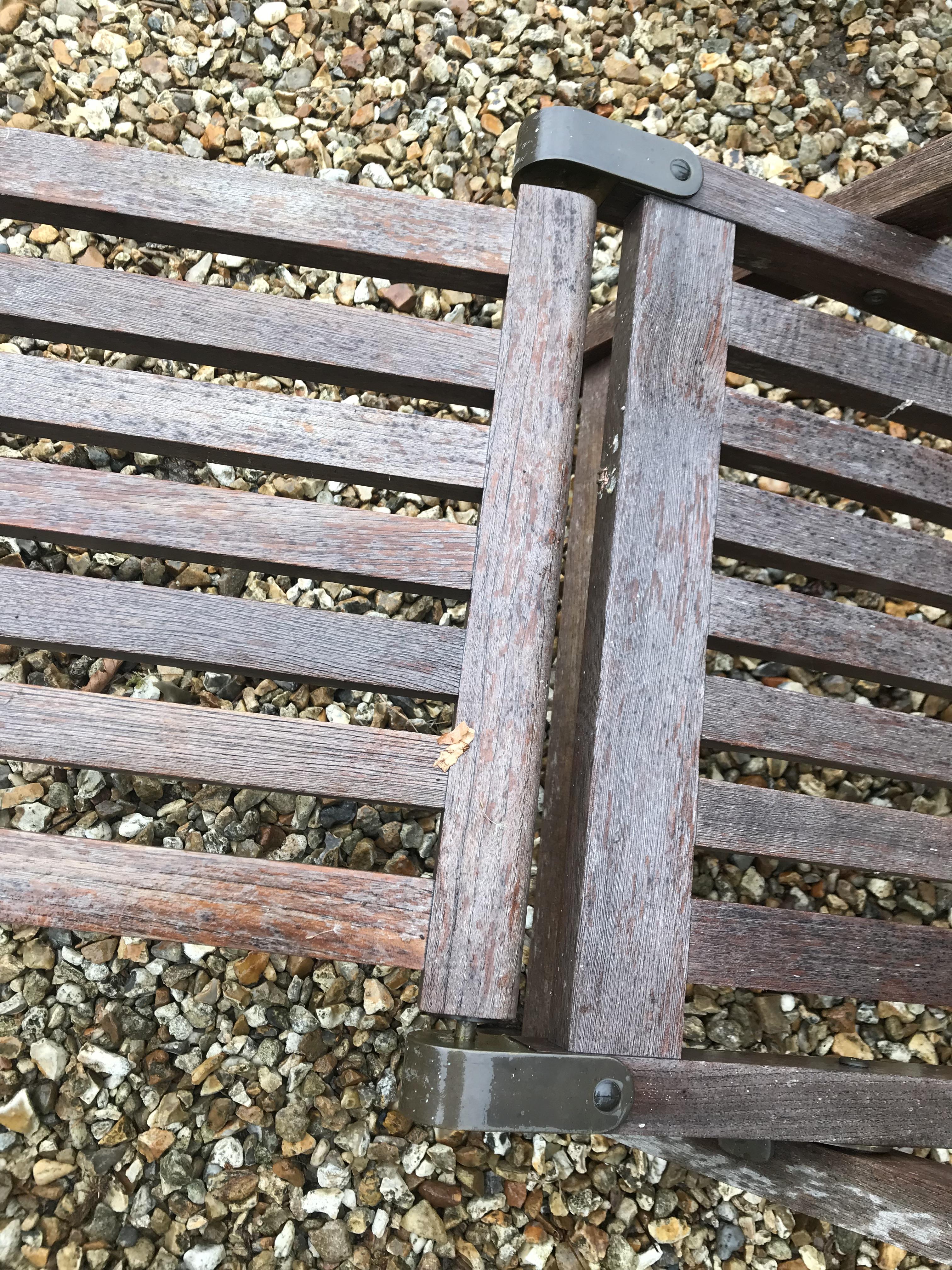 A pair of teak slatted garden steamer type chairs CONDITION REPORTS Have general - Image 6 of 11