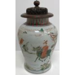 An 18th Century Chinese baluster shaped vase decorated with Kylin/Qilin and figures in a garden
