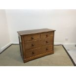 A Victorian mahogay chest of two short over two long drawers on bracket feet,