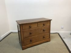 A Victorian mahogay chest of two short over two long drawers on bracket feet,