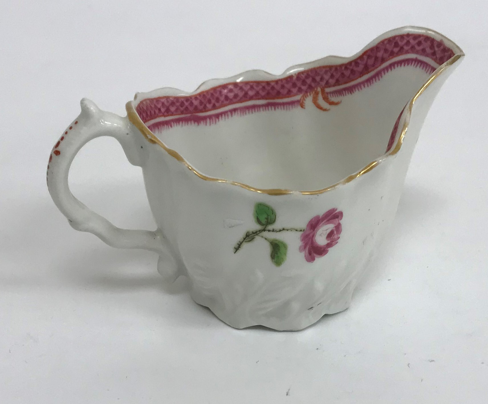 An 18th Century silver shaped Chelsea type cream jug with relief work foliate decoration and floral - Image 8 of 30