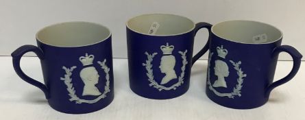 Three Wedgwood blue Jasperware royal commemorative mugs for Edward VIII 1937 and George VI and