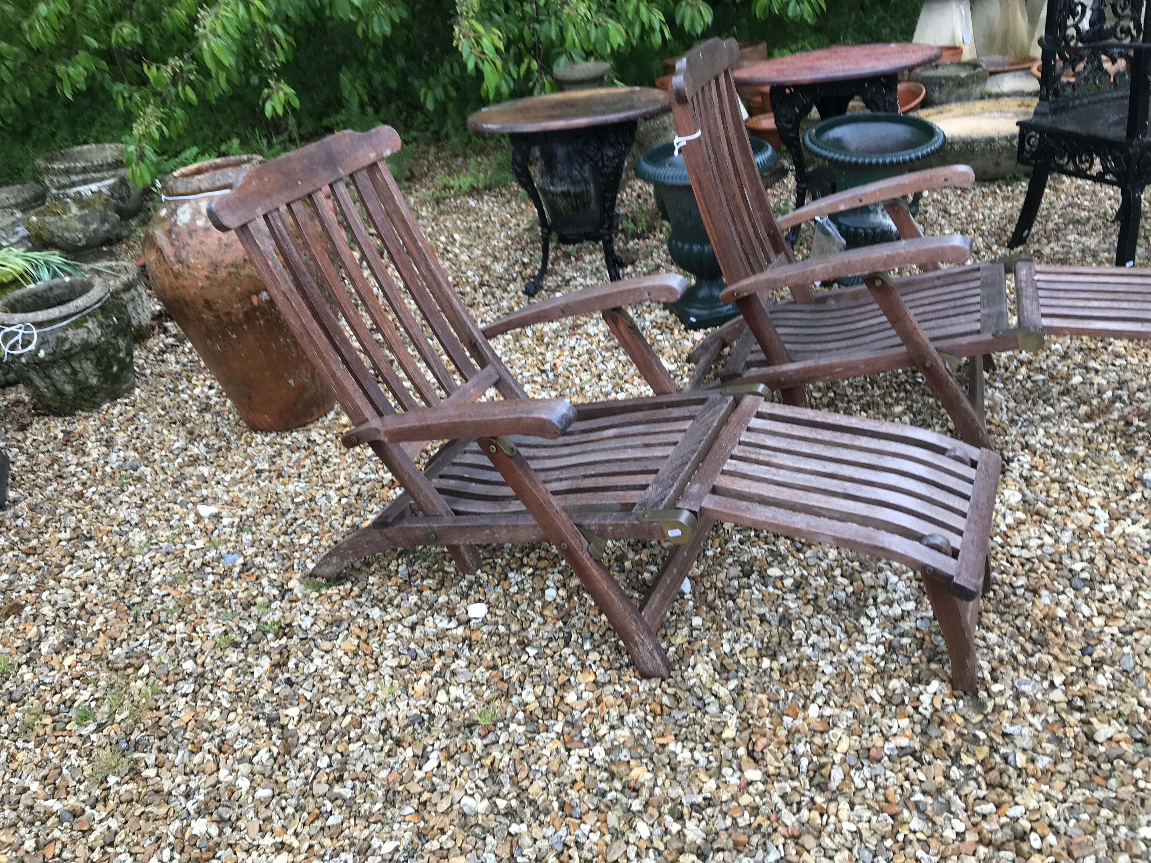 A pair of teak slatted garden steamer type chairs CONDITION REPORTS Have general - Image 8 of 11