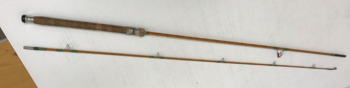 A Hardy Wanless Palakona split cane two piece 9ft 6" salmon spinning rod with Hardy cloth bag
